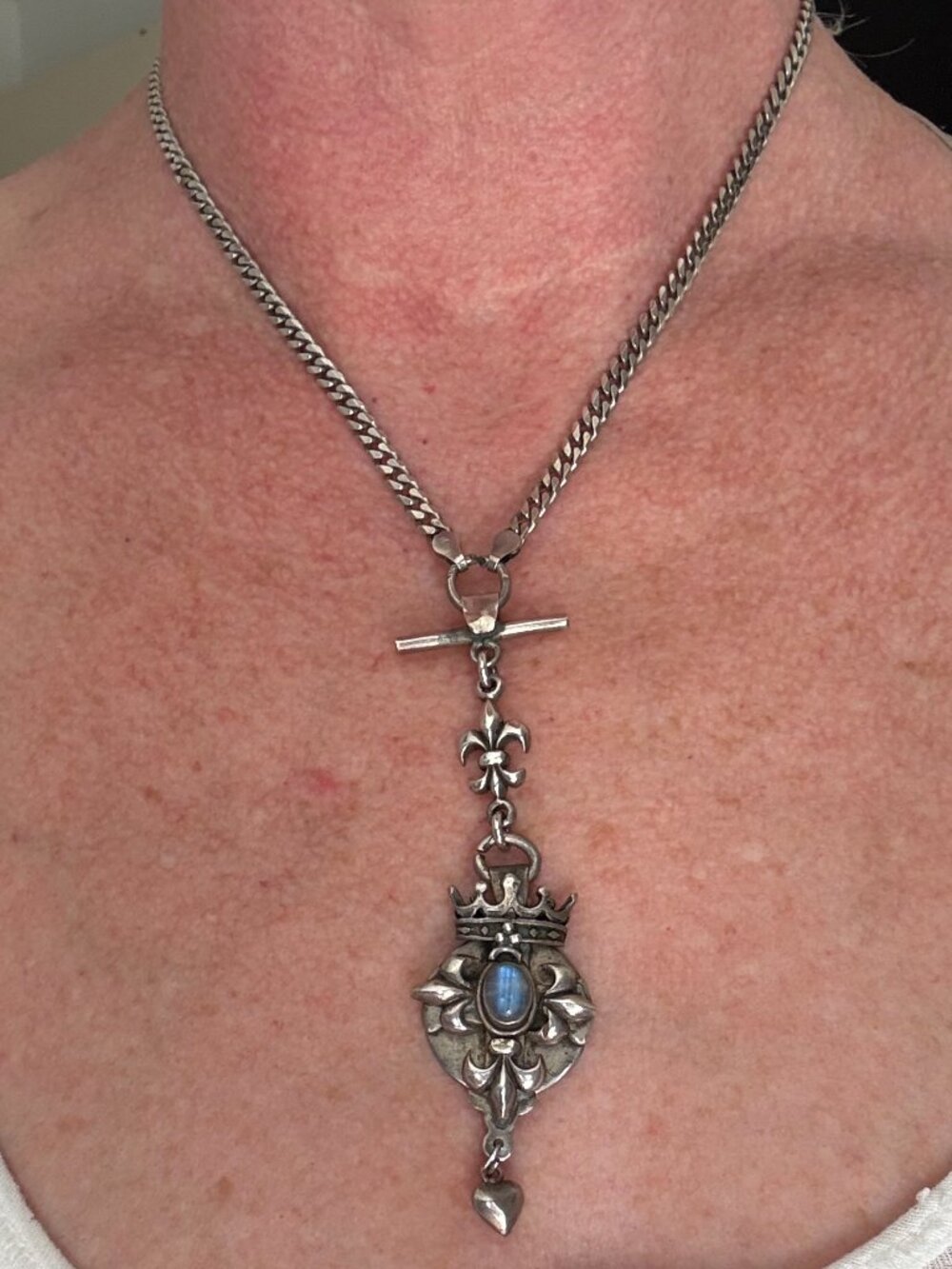 Fleur de Lis 925 silver necklace with pale blue opal-like gem & crown